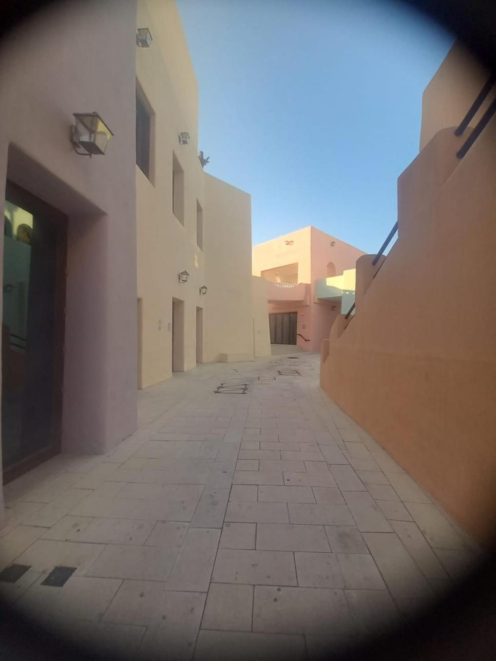 Mina Hotel And Residences By The Torch Doha Kültér fotó A street in Al-Qatif